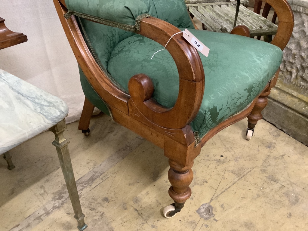 A mid Victorian upholstered mahogany armchair, width 66cm, depth 70cm, height 94cm